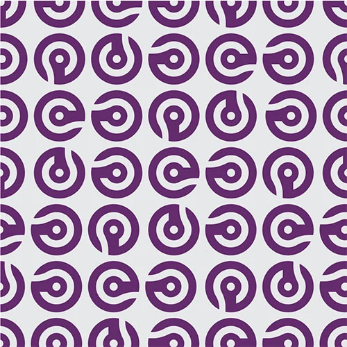 The mark tiled into a repeating pattern, rotating through every orientation.