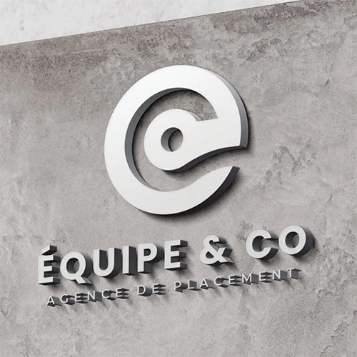 The Équipe & Co. mark as dimensional white lettering on a concrete wall.