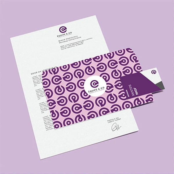 Letterhead, patterned card and business card staged on lilac.