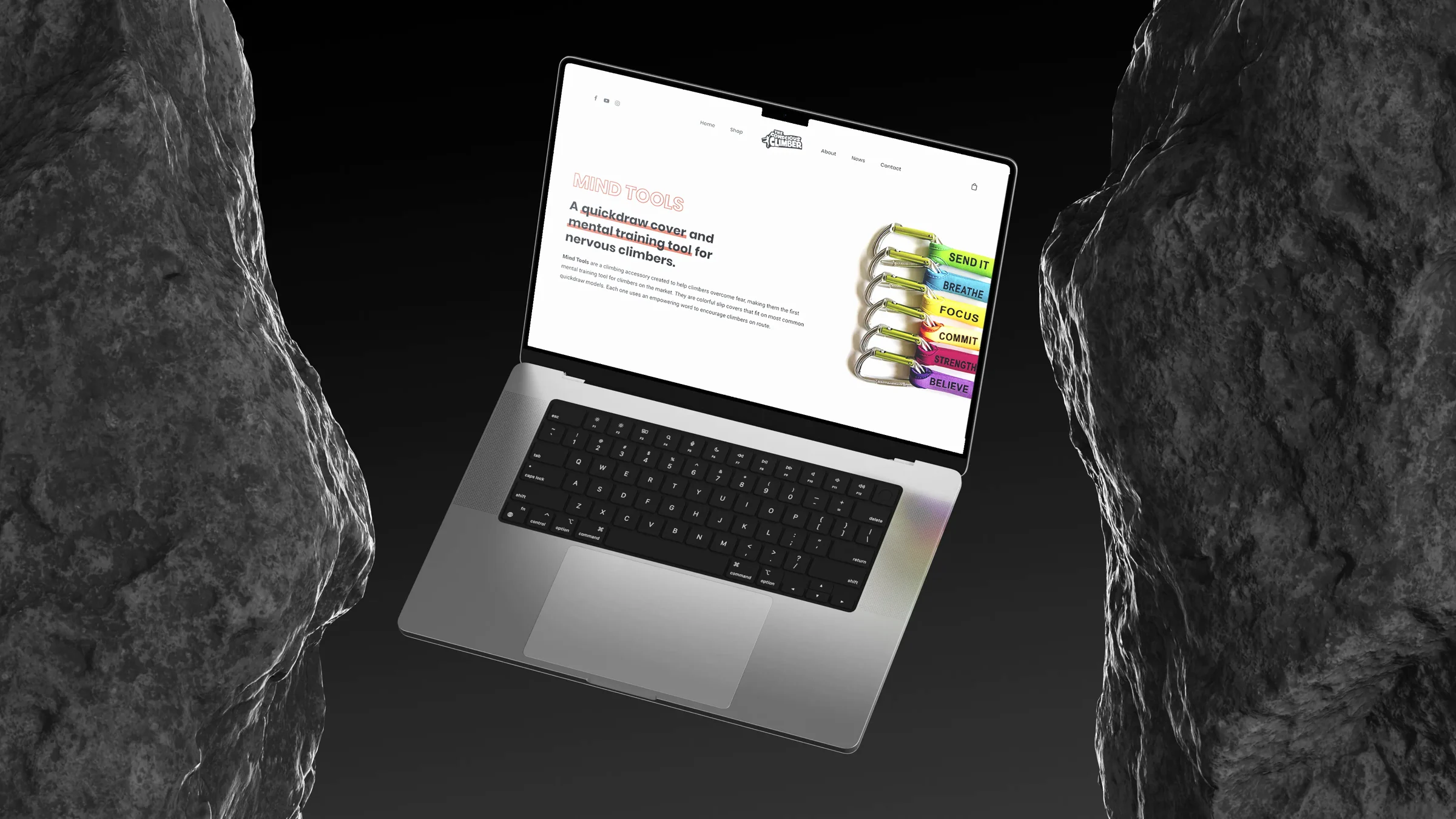 The Mind Tools store on a laptop, staged on dark rock.