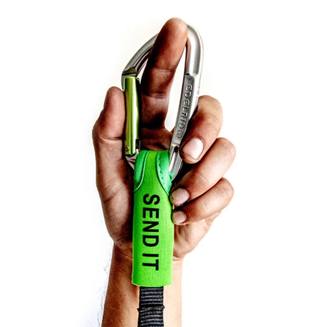 A fist gripping a carabiner wearing the green SEND IT sleeve.