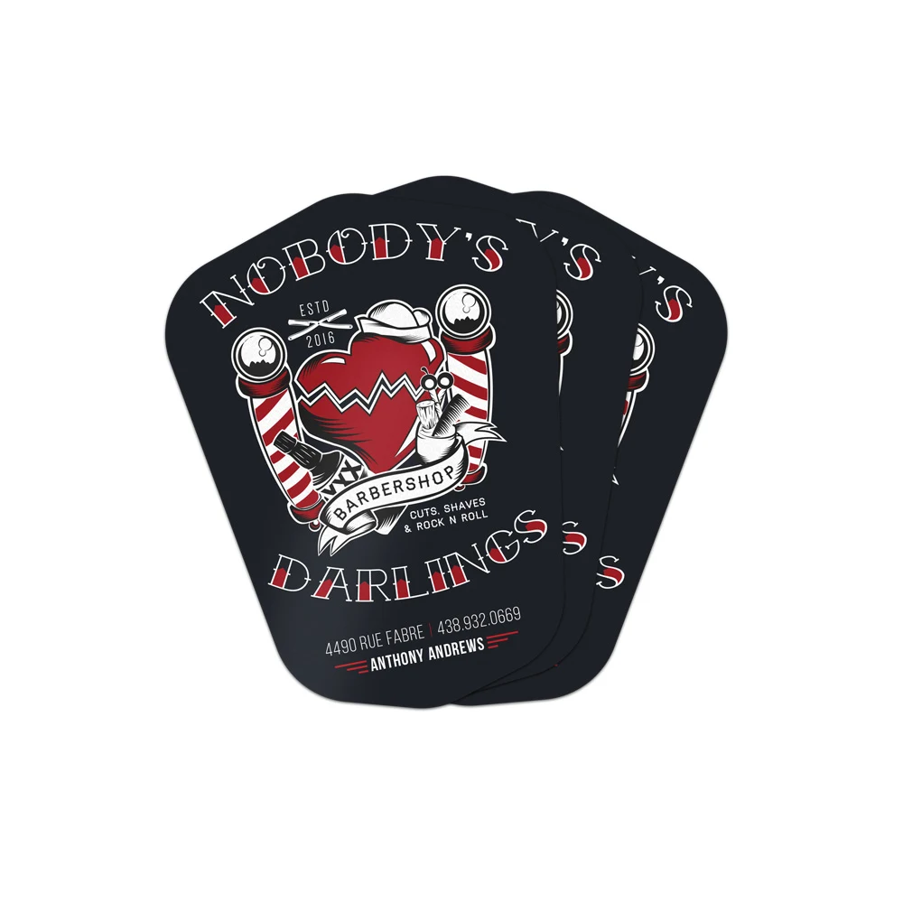 Die-cut stickers fanned out, the crest cut to its own silhouette.